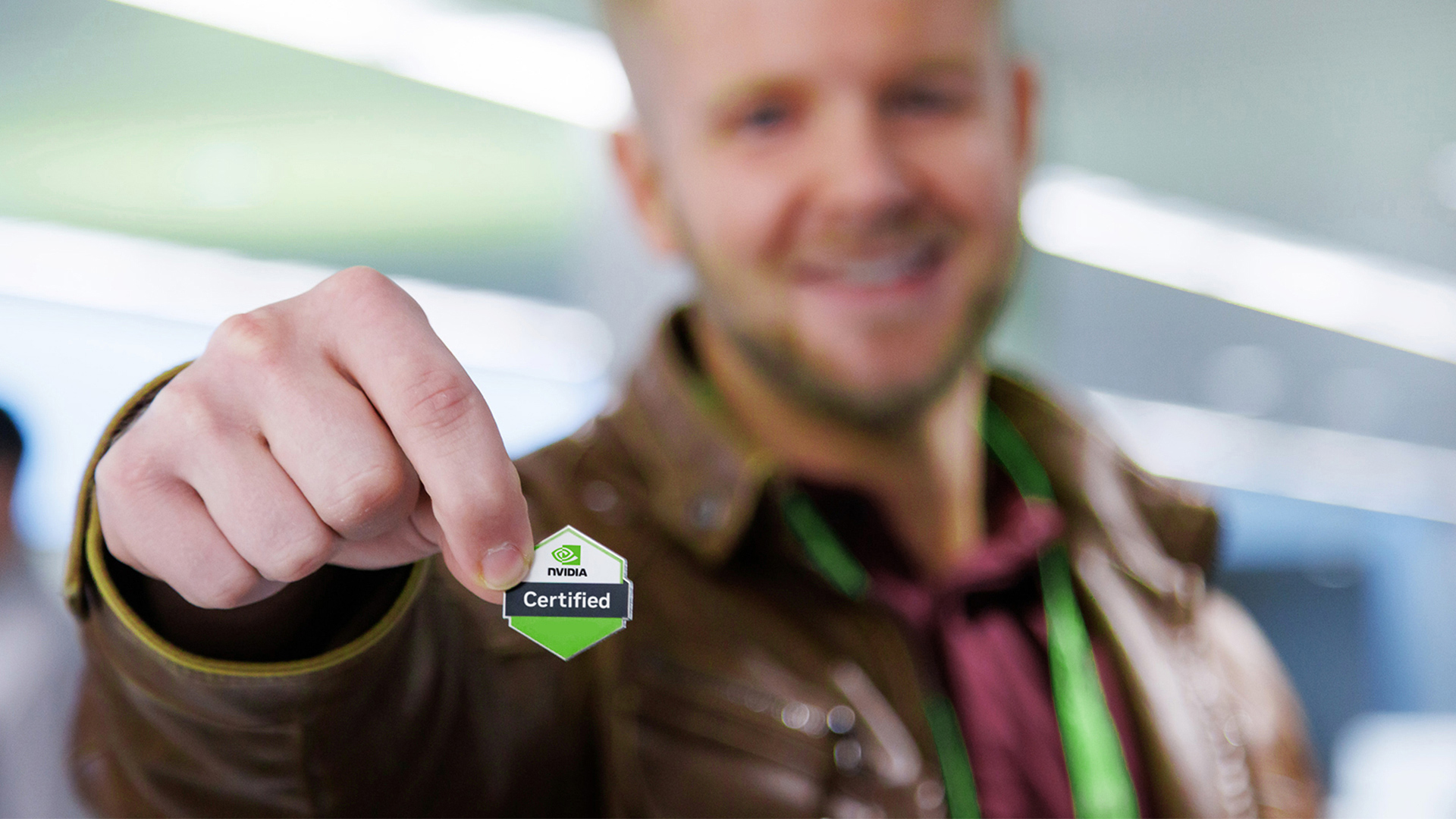 An expert instructor teaches a developer at a GTC workshop
