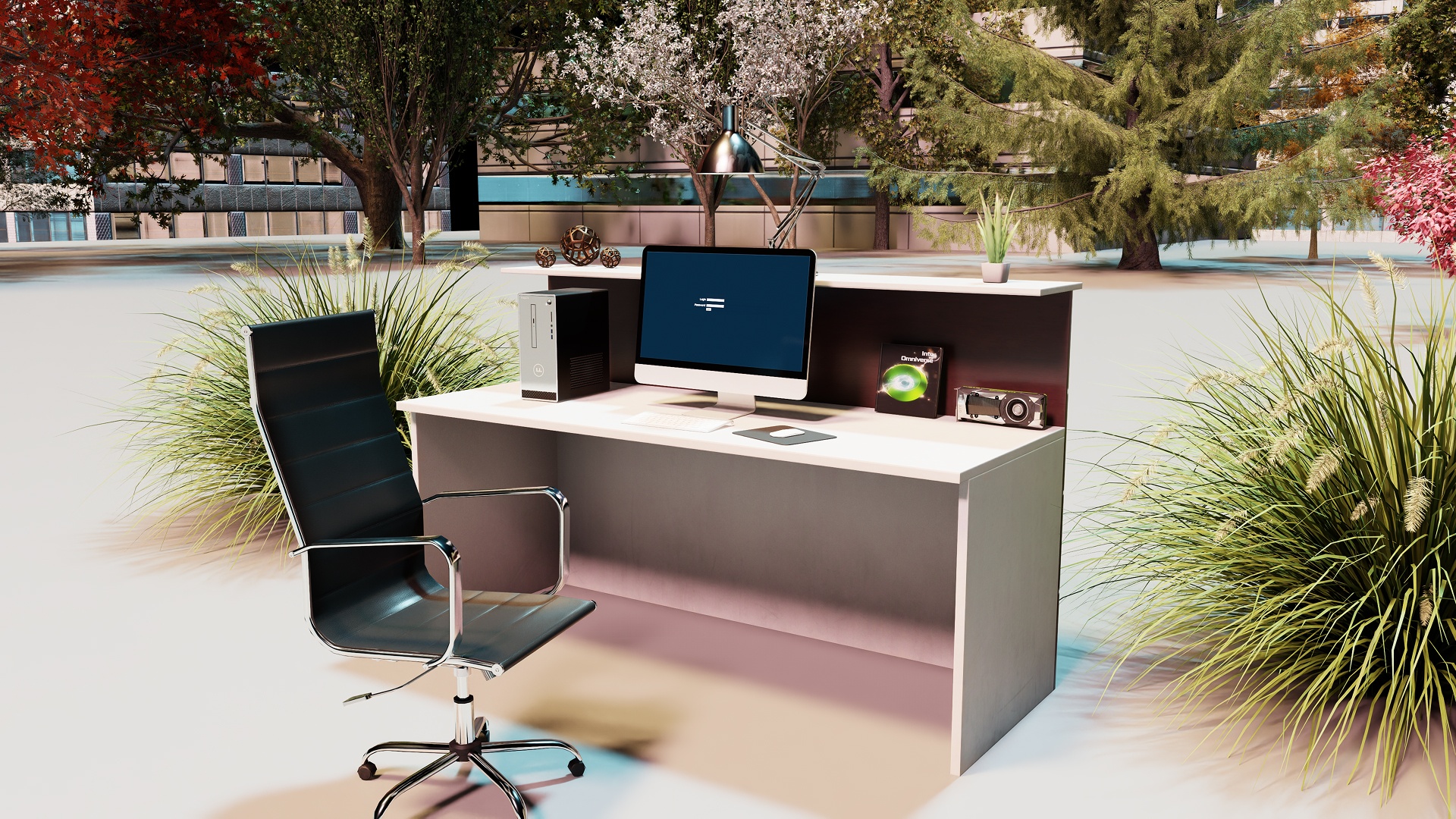 A desk setup with a black leather chair sits outdoors in a park-like setting.