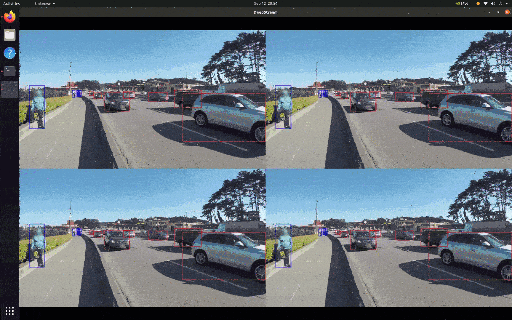 People are detected with a blue bounding box and cars with a red bounding box.