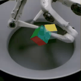 GIF of robot picking up a 3D cube and setting it down strategically.